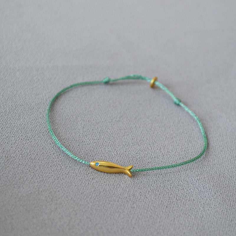 Blue Thread Braided Gold Fish Ultra - Thin Bracelet - Jewelry de Corner